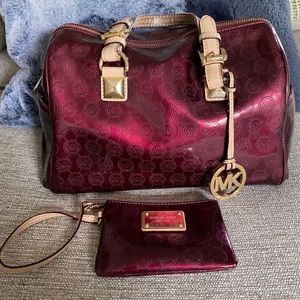 Michael Kors Burgundy purse and wristlet